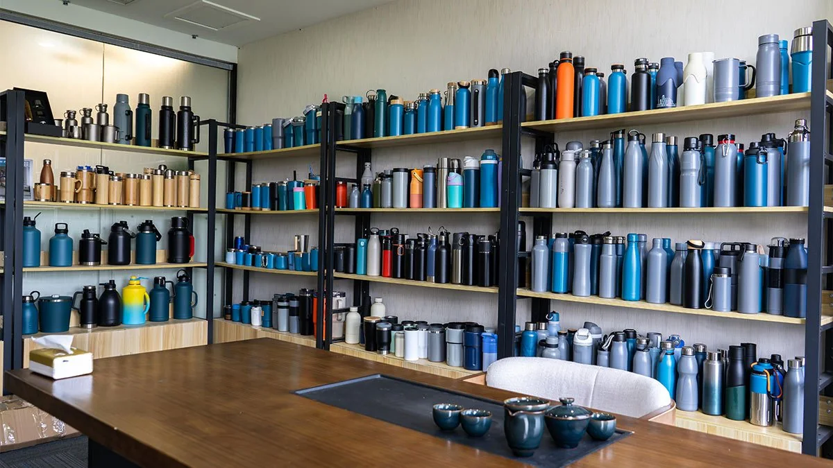 UMUG drinkware sample room wall